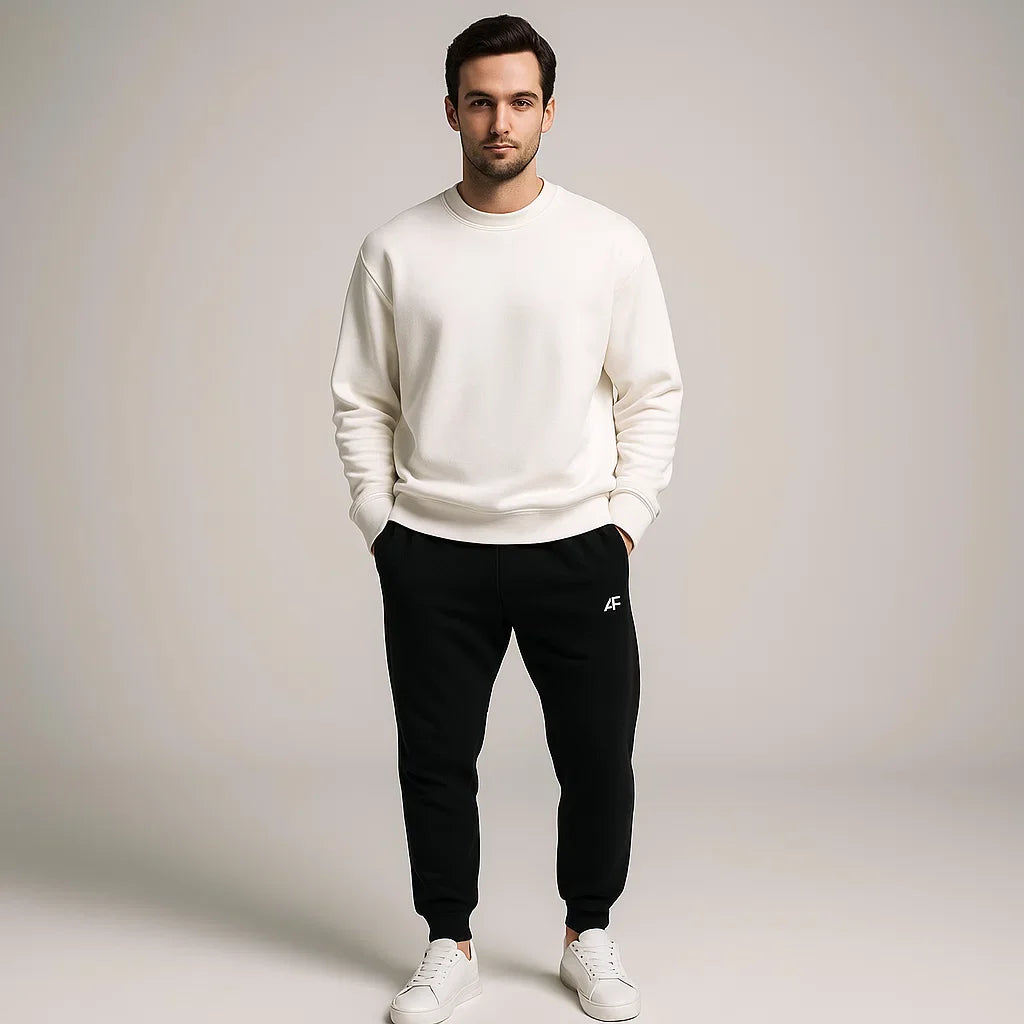 Men's white crew neck sweatshirt and black joggers set – modern tracksuit for casual wear, sports or relaxed outfits