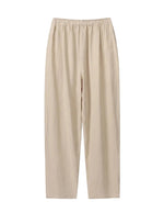 Beige pants on a light gray background