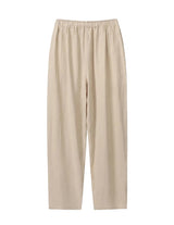Beige pants on a light gray background