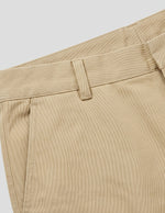 Beige men’s straight fit trousers with button waistband close-up details