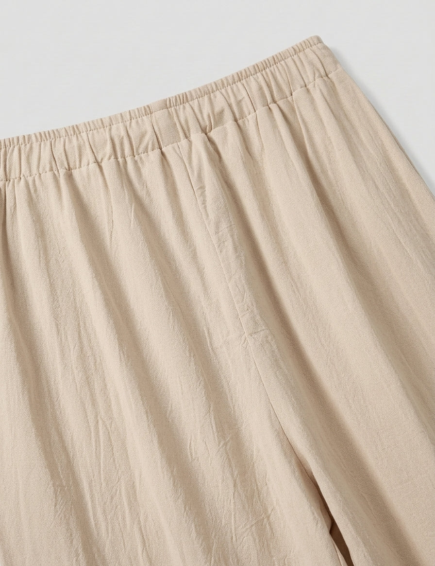 Beige pants on a light gray background
