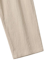 Beige pants on a white background