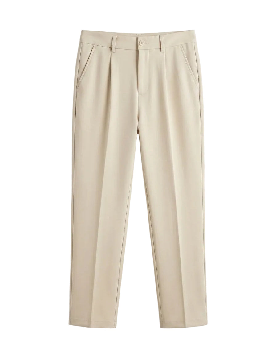 Beige pants on a light gray background