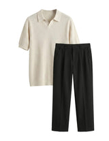 Beige polo shirt and black pants on a light gray background