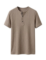 Beige short-sleeve henley shirt on a light gray background