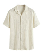 Beige short-sleeve shirt on a white background