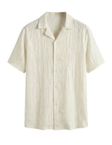 Beige short-sleeve shirt on a white background