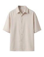 Beige short-sleeve shirt on a white background