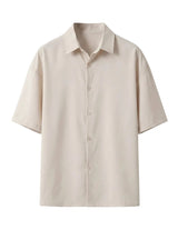 Beige short-sleeve shirt on a white background