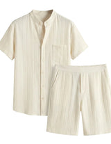 Beige striped shirt and shorts set on a white background