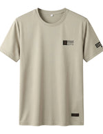 Beige t-shirt with text design on a light gray background