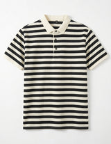 Black and white striped polo shirt on a white background