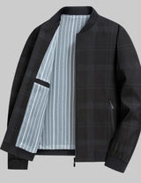 Black checkered jacket with a striped inner lining on a light gray background