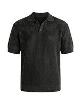 Black knitted polo shirt on a light gray background