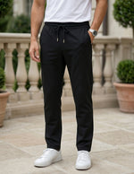 Black men’s lightweight drawstring pants with elastic waistband and clean casual fit