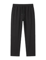 Black men’s lightweight drawstring pants with elastic waistband and clean casual fit product