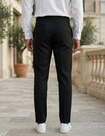 Black men’s pleated tailored pants with clean front closure and straight fit back view