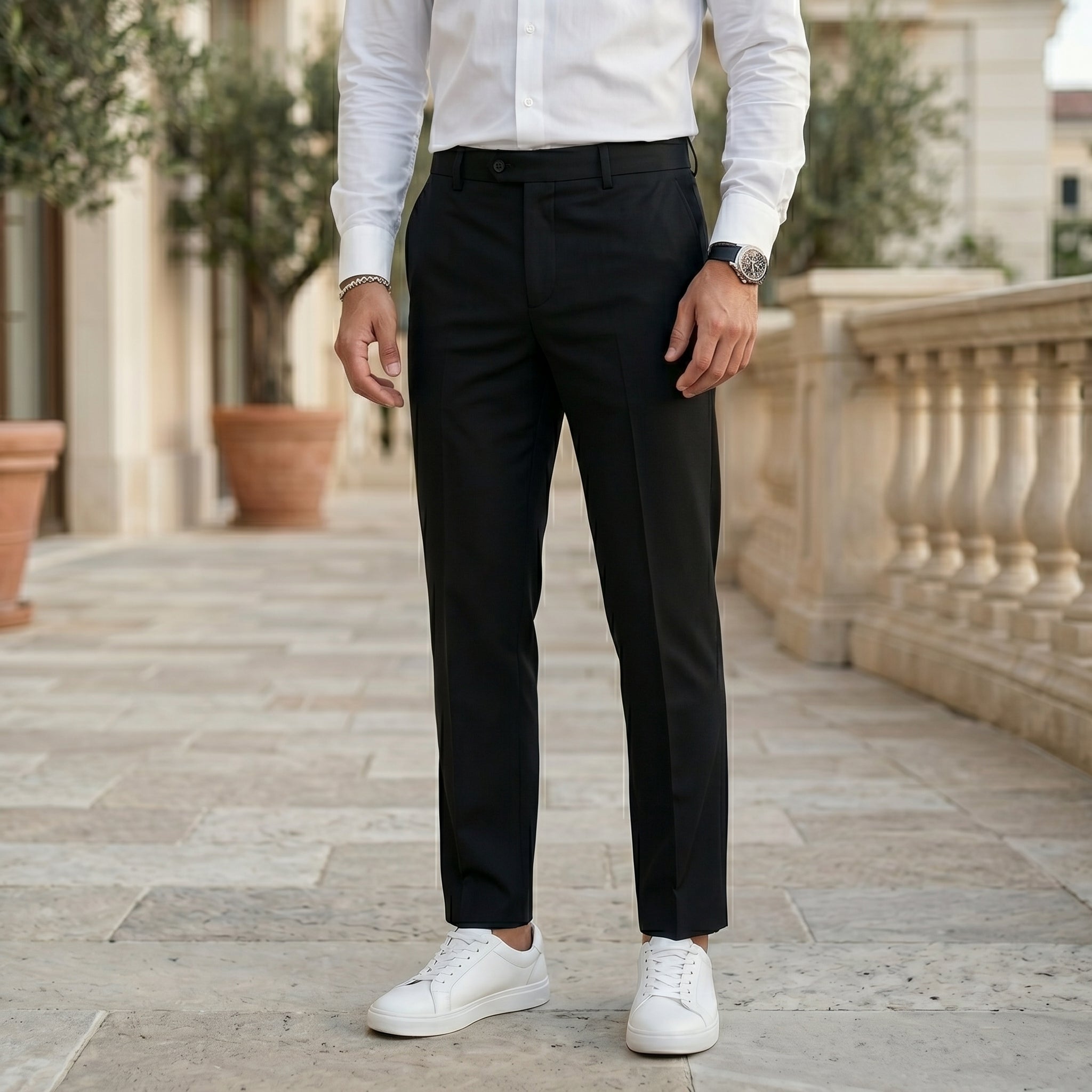 Black men’s pleated tailored pants with clean front closure and straight fit bottom