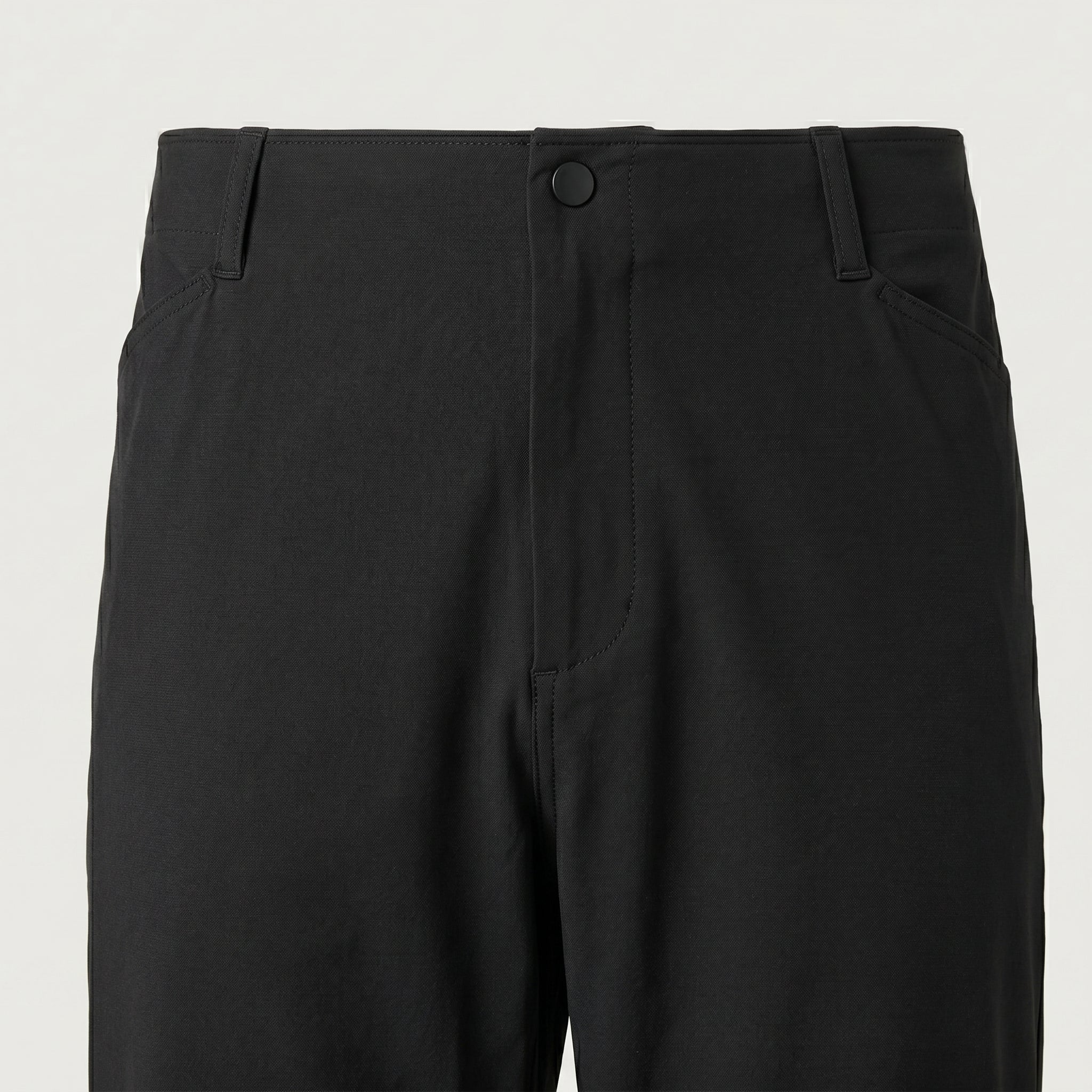 Black men’s stretch pocketed pants with clean straight fit and button-front closure close-up details