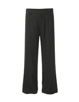 Black pants on a light gray background