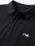Black polo shirt with a small embroidered logo on the chest.
