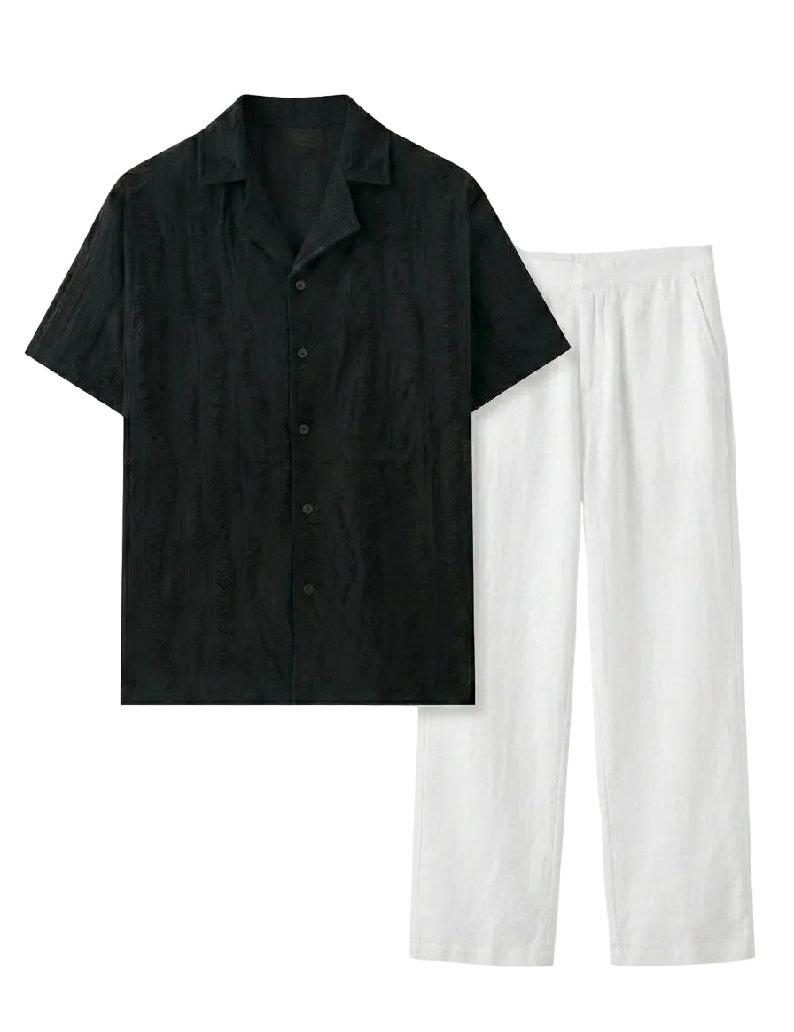 Black short-sleeve shirt and white pants on a white background