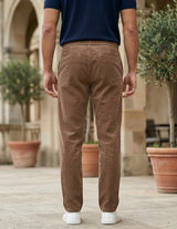 Brown men’s ribbed drawstring pants with elastic waistband and side pockets back view