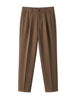 Brown pants on a light gray background