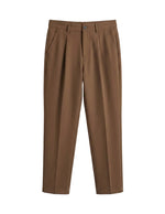 Brown pants on a light gray background