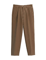 Brown pants on a light gray background