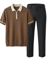 Brown polo shirt with white collar and trim next to black pants on a light gray background
