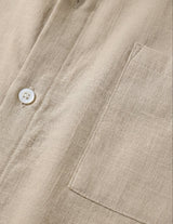 Cala - Khaki men’s oversized buttoned summer shirt - button close-up shot