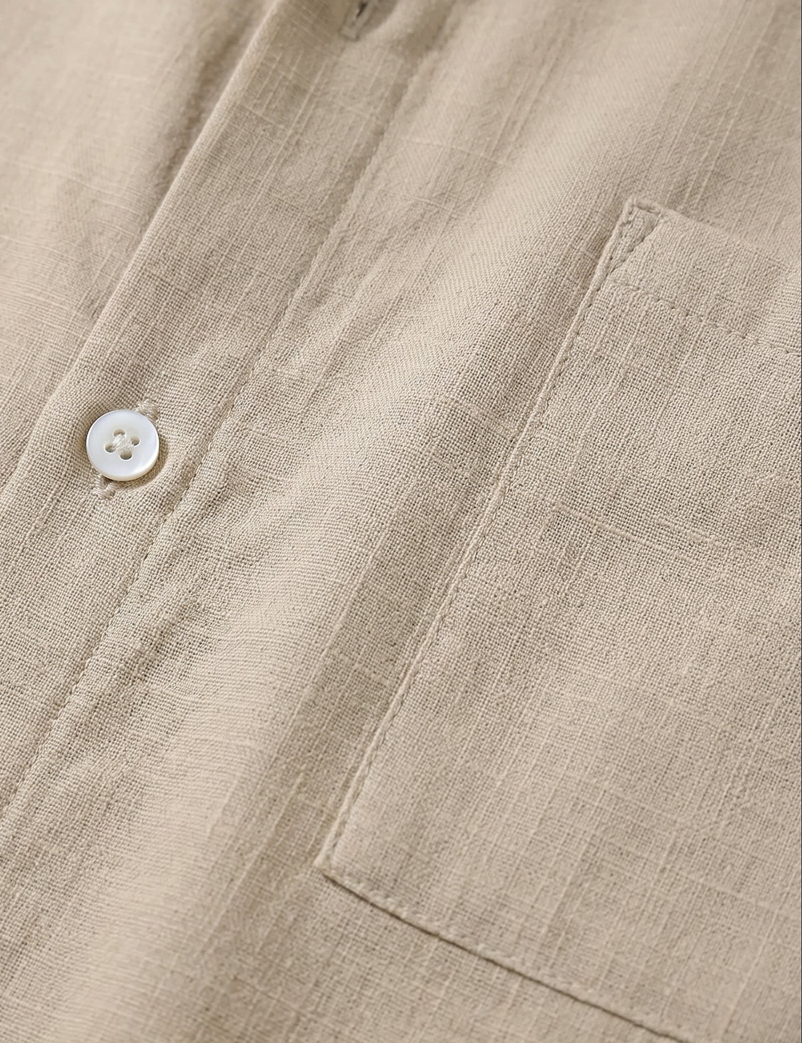 Cala - Khaki men’s oversized buttoned summer shirt - button close-up shot
