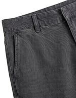 Close-up detail of charcoal gray casual pants waistband, side pocket, and textured fabric.