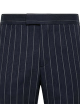 Close-up detail of navy pinstripe pants waistband with elastic back and vertical stripe pattern.