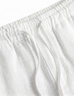Close-up_detail_of_white_relaxed-fit_pants_waistband__with_soft_textured_fabric._cb85d55f-8ca3-430d-807b-3e4566e3914f