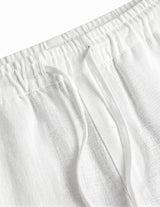 Close-up_detail_of_white_relaxed-fit_pants_waistband__with_soft_textured_fabric._cb85d55f-8ca3-430d-807b-3e4566e3914f