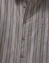 Close-up of a brown and blue striped shirt with button details