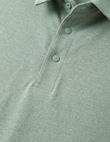 Close-up of a green polo shirt with buttons