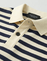 Close-up of a navy and white striped polo shirt with a brand label.