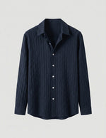 Dark blue button-up shirt on a light gray background