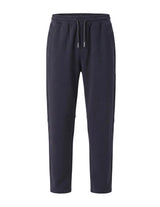 Dark blue men’s lightweight drawstring pants with elastic waistband and side pockets