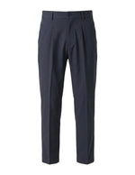 Dark blue men’s pleated tailored pants with belt loops and straight-leg silhouette