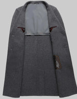 Gray coat with a visible brand label on a white background