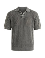 Gray knitted polo shirt on a light gray background