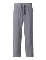 Gray men’s ribbed casual pants with black drawstring and straight-leg fit