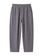 Gray pinstripe relaxed-fit pants with straight legs on a white background.