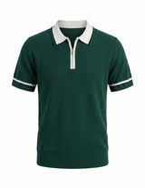 Green polo shirt with white collar and trim on a white background