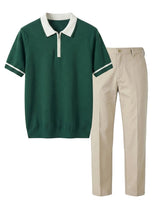 Green polo shirt with white collar and trim, paired with beige pants on a light gray background