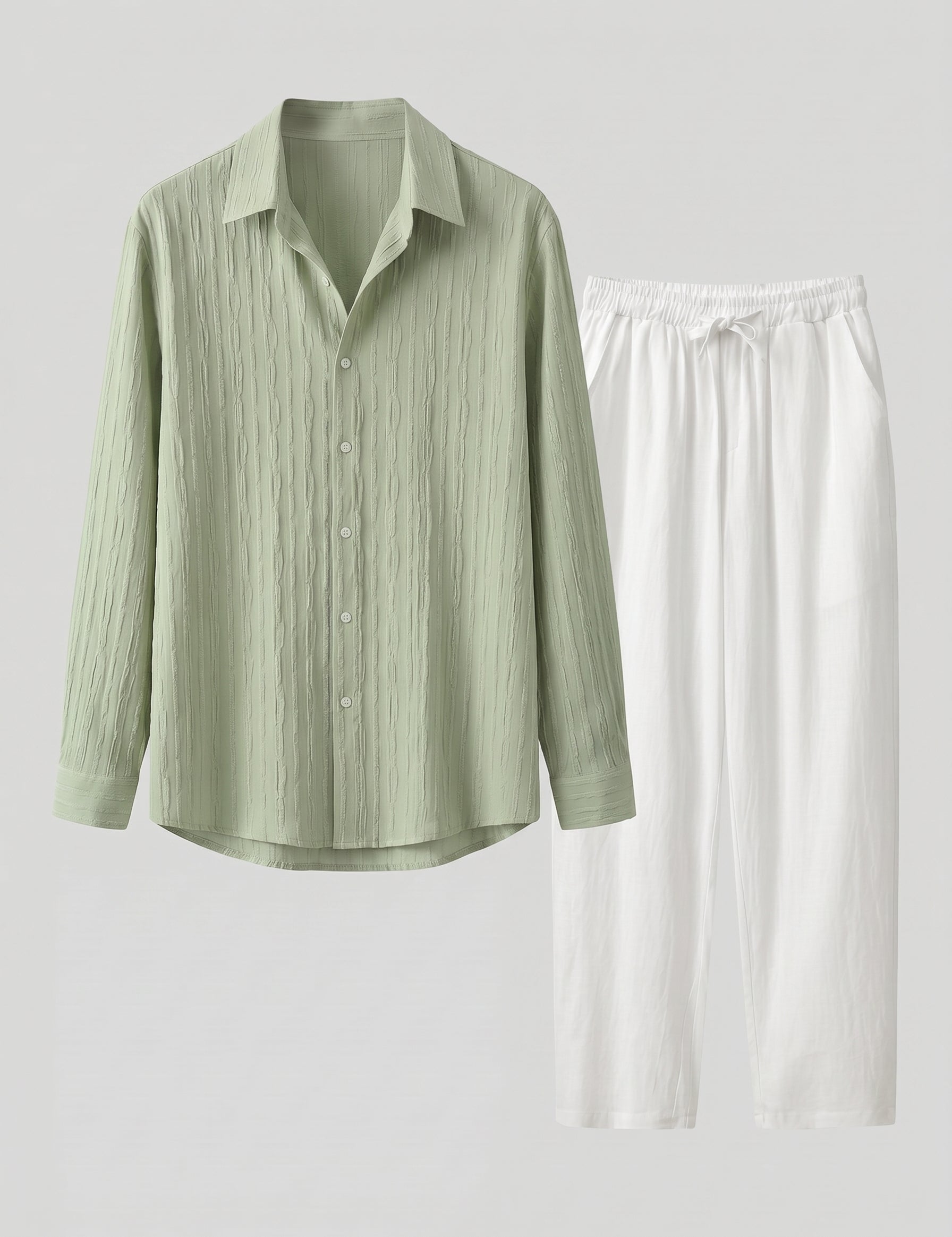 Green striped shirt and white pants on a light gray background